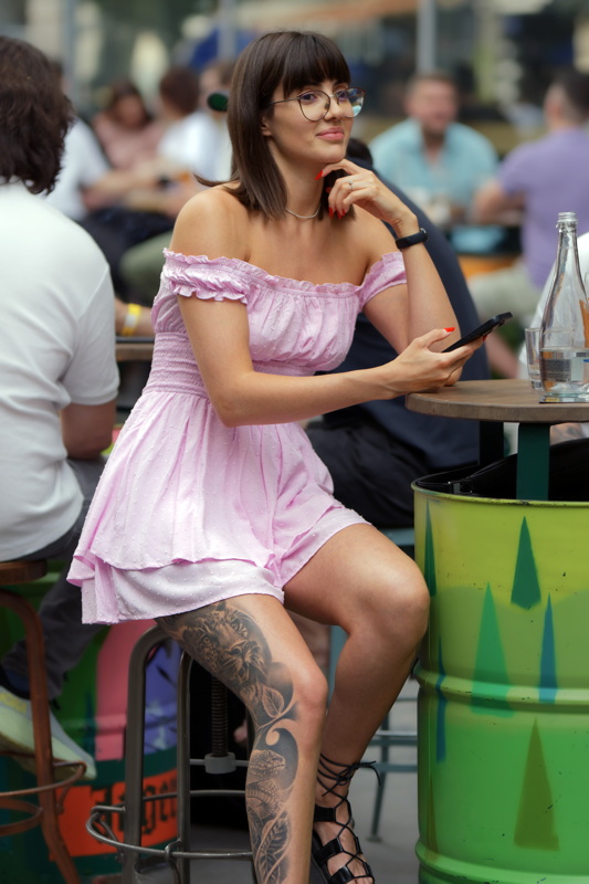 Young woman with tattoo